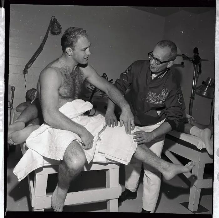 Framed Print : Trainer Attending to Bobby Hull Framed Print : Trainer Attending to Bobby Hull