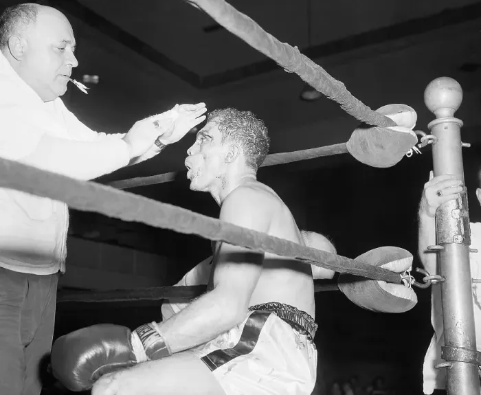 Framed Print : Trainer Attending to Boxers Cut Eye