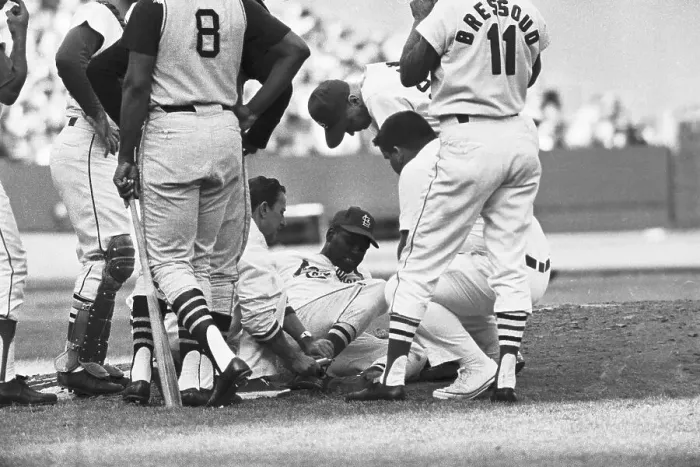 Framed Print : Trainer Clarence Bauman Working on Injured Bob Gibson Framed Print : Trainer Clarence Bauman Working on Injured Bob Gibson