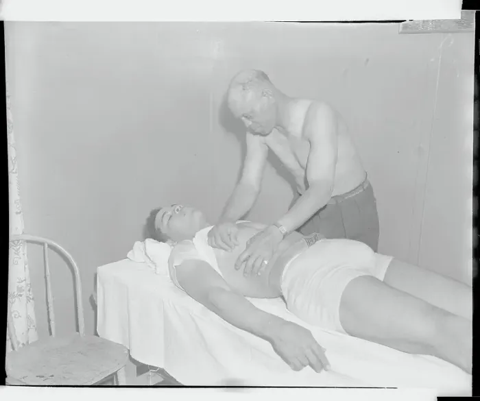Framed Print : Trainer Massaging Joe Louis Framed Print : Trainer Massaging Joe Louis