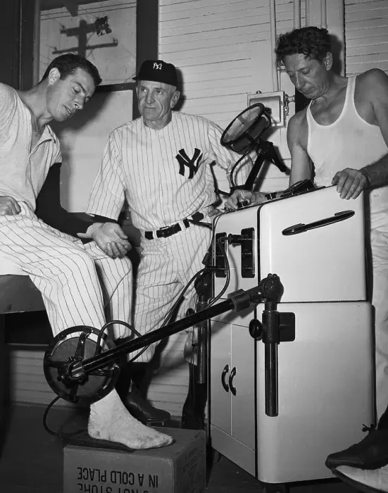 Framed Print : Trainer Treating Joe DiMaggio Framed Print : Trainer Treating Joe DiMaggio