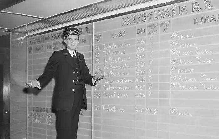 Framed Print : Trainman Stands Before Arrival Board Framed Print : Trainman Stands Before Arrival Board