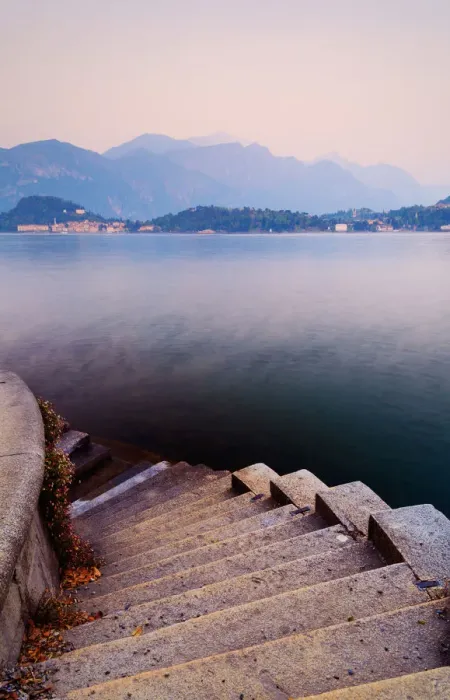 Framed Print : Tranquil. Street lamps light up park pathway along most beautiful lakes in Italy Framed Print : Tranquil. Street lamps light up park pathway along most beautiful lakes in Italy