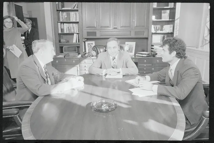 Framed Print : Transition Teams Conversing at Table