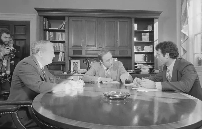 Framed Print : Transition Teams Conversing at Table