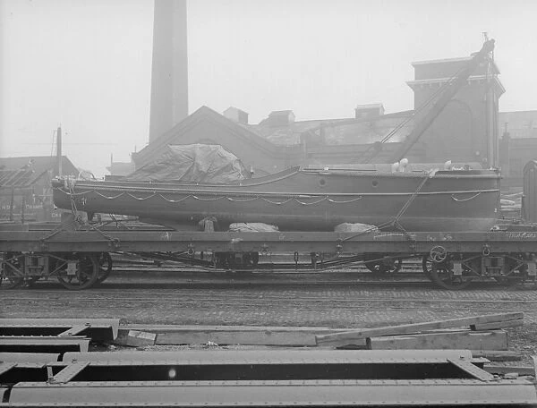 Transport. 19th October 1918: A motorboat on a railway wagon at Nine Elms goods yard