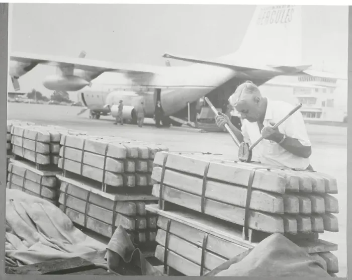 Framed Print : Transportation Worker Clipping Together Copper Transports Framed Print : Transportation Worker Clipping Together Copper Transports