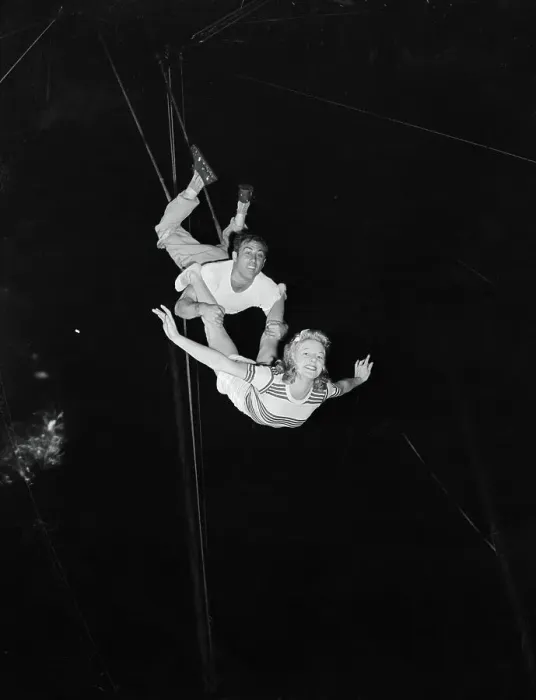 Framed Print : Trapeze Artists Practicing a Routine Framed Print : Trapeze Artists Practicing a Routine