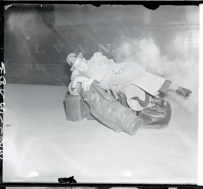 Framed Print : Traveler Sleeping on Luggage Framed Print : Traveler Sleeping on Luggage