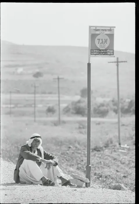 Framed Print : Traveler Waiting for Bus at Stop Framed Print : Traveler Waiting for Bus at Stop