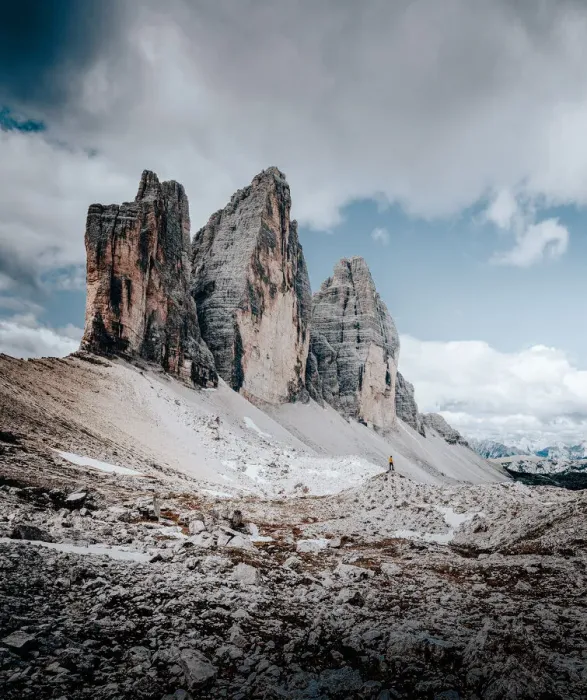 Framed Print : Tre Cime di Lavaredo, Dolomites Alps, Italy. hiker silhouette in the distance Framed Print : Tre Cime di Lavaredo, Dolomites Alps, Italy. hiker silhouette in the distance