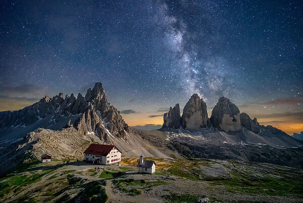 Tre Cime di Lavaredo at night with a milky way on background. Dolomites, Italy