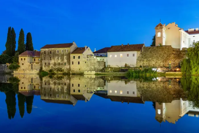 Framed Print : Trebinje reflected in the TrebiAanjica river at night, Bosnia and Herzegovina Framed Print : Trebinje reflected in the TrebiAanjica river at night, Bosnia and Herzegovina