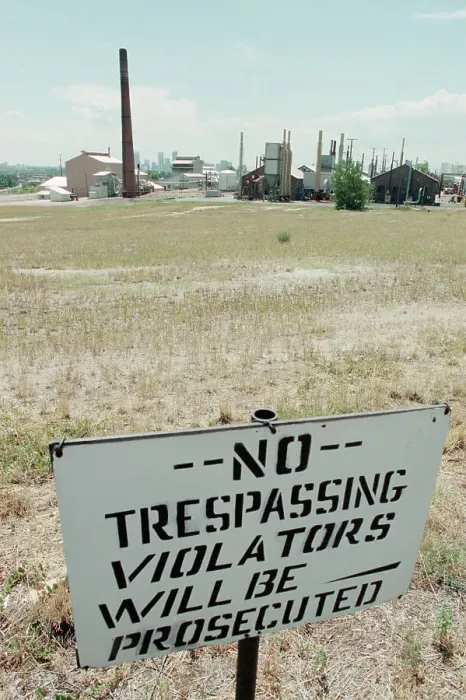 Framed Print : No Trespassing Sign In Field By Factory Framed Print : No Trespassing Sign In Field By Factory