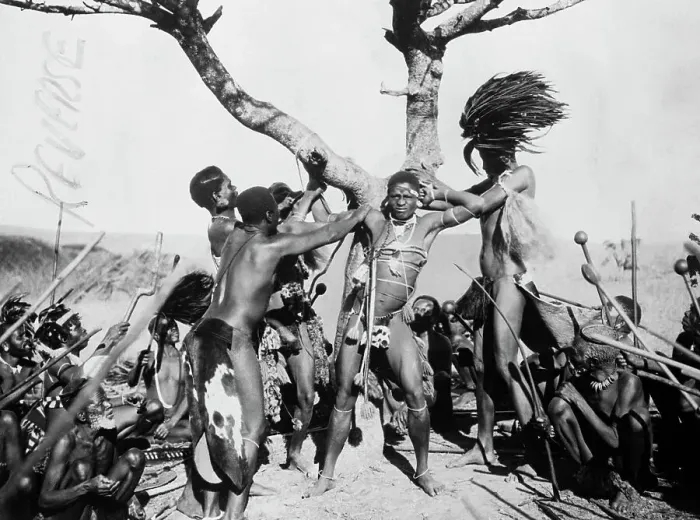 Framed Print : Tribe Members Tie Man to Tree for Exorcism Framed Print : Tribe Members Tie Man to Tree for Exorcism