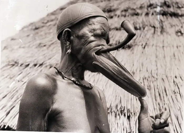 Framed Print : Tribesman Showing His Lip Discs