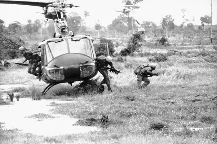 Framed Print : US Troops Jumping off Helicopter and into Battle Framed Print : US Troops Jumping off Helicopter and into Battle