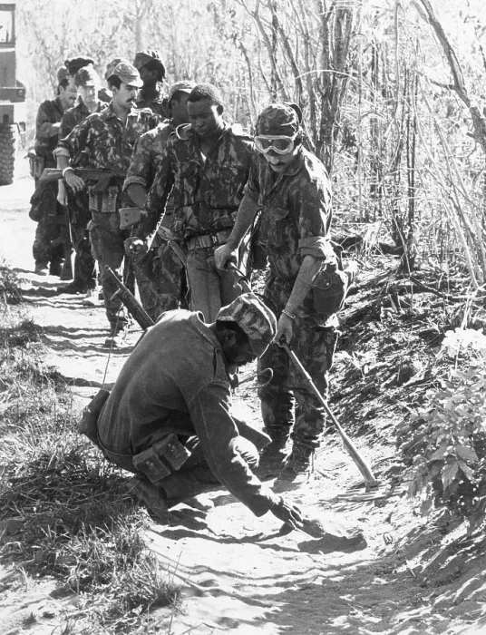 Framed Print : Troops On Patrol Uncover Land Mine Framed Print : Troops On Patrol Uncover Land Mine