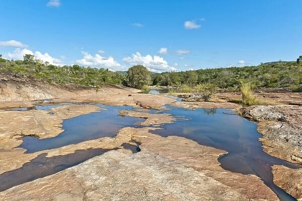 Tropical dry forest landscape with river and rocks, rocky riverbed, Andohahela National Park, near Fort-Dauphin or Tolagnaro, Madagascar