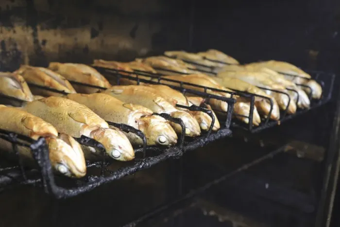 Framed Print : Trouts are being smoked in a smoker or smokehouse, Bergisches Land, Germany Framed Print : Trouts are being smoked in a smoker or smokehouse, Bergisches Land, Germany