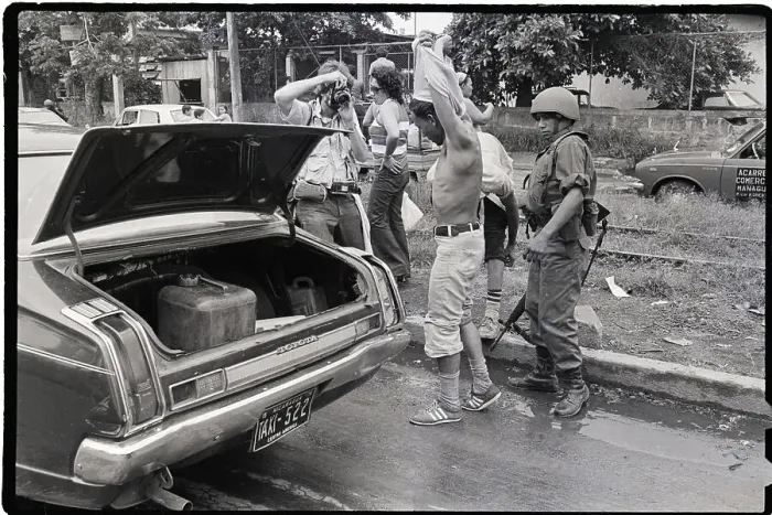 Framed Print : Truck Driver Being Searched