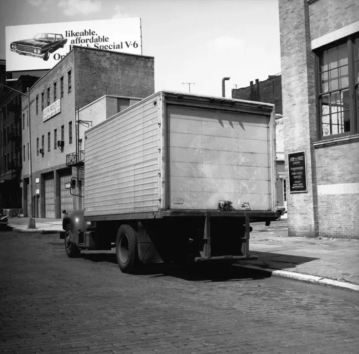 Framed Print : Truck parked at sidewalk, (rear view), (B&W)