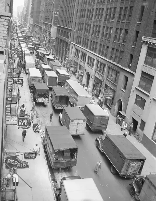 Framed Print : Trucks Parked and in Slow Procession