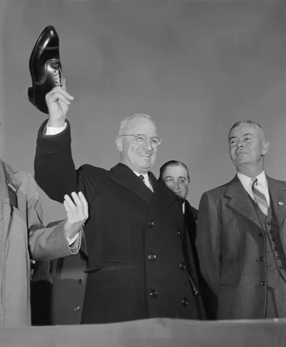 Framed Print : Truman Holding up a Shoe Framed Print : Truman Holding up a Shoe