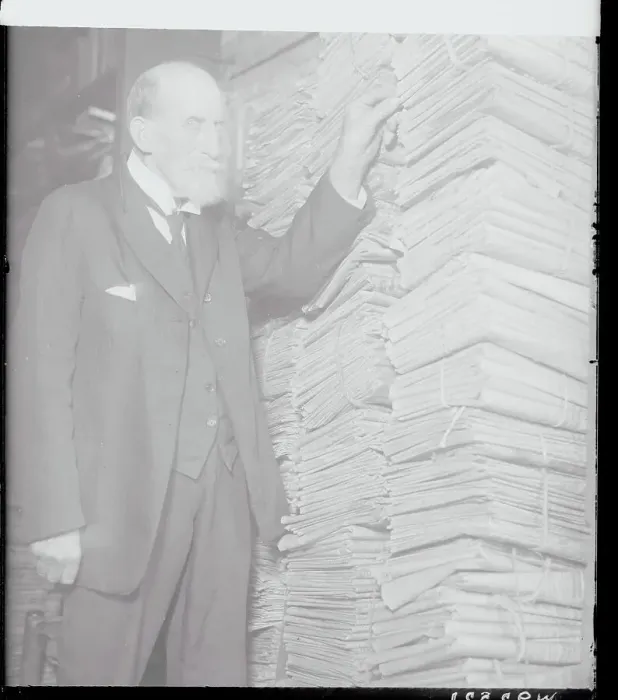 Framed Print : T.S. Leisenring Posing with Newspapers Framed Print : T.S. Leisenring Posing with Newspapers