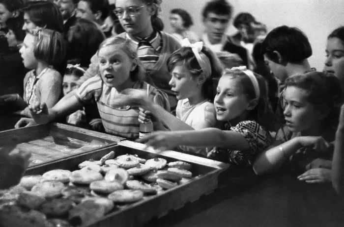 Framed Print : Tuck Shop. 4th December 1954: Hungry Children reaching for some cakes after Framed Print : Tuck Shop. 4th December 1954: Hungry Children reaching for some cakes after