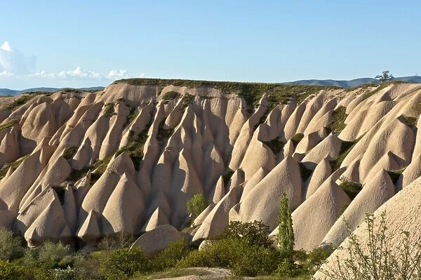 Tufa formations formed by erosion, Goreme National Park, Uchisar, Cappadocia, Nevsehir Province, Central Anatolia Region, Turkey