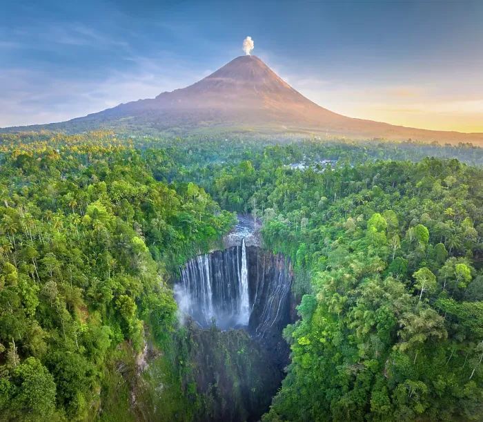 Framed Print : Tumpak Sewu Waterfall with Semeru Volcano, East Java, Indonesia Framed Print : Tumpak Sewu Waterfall with Semeru Volcano, East Java, Indonesia