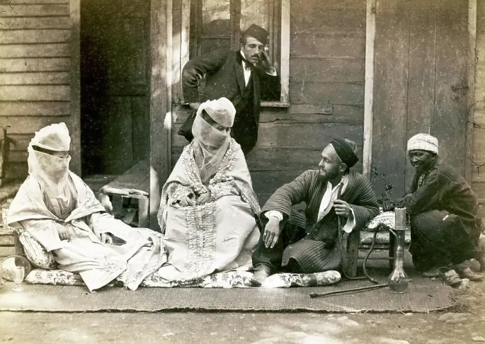 Framed Print : Turkish family in front of their home, woman are veiled, men with hookah, around 1870, Turkey, Historic, digitally restored reproduction from a 19th century original Framed Print : Turkish family in front of their home, woman are veiled, men with hookah, around 1870, Turkey, Historic, digitally restored reproduction from a 19th century original