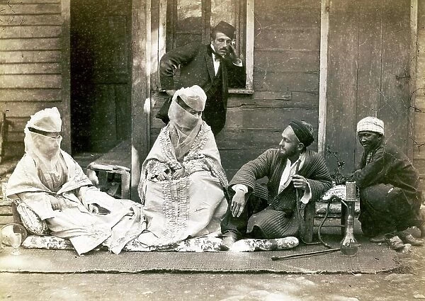 Turkish family in front of their home, woman are veiled, men with hookah, around 1870, Turkey, Historic, digitally restored reproduction from a 19th century original