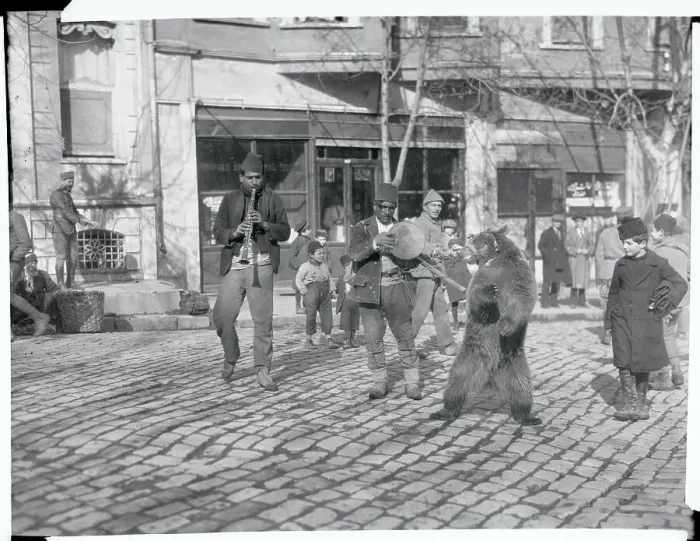 Framed Print : Turkish Street Band Performing with Bear