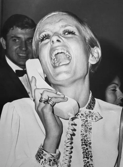 Framed Print : Twiggy Laughing on the Phone Framed Print : Twiggy Laughing on the Phone