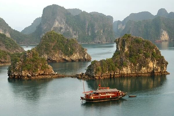 Twilight over the island world of the UNESCO-declared world natural heritage Halong Bay Viet Nam