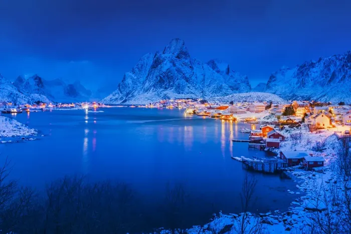 Framed Print : Twilight time of Idyllic coastal village at Reine in winter, Norway Framed Print : Twilight time of Idyllic coastal village at Reine in winter, Norway