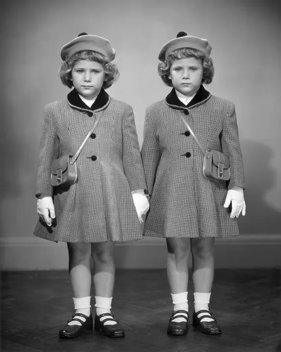 Framed Print : Twin girls in hats & coats wearing white gloves Framed Print : Twin girls in hats & coats wearing white gloves