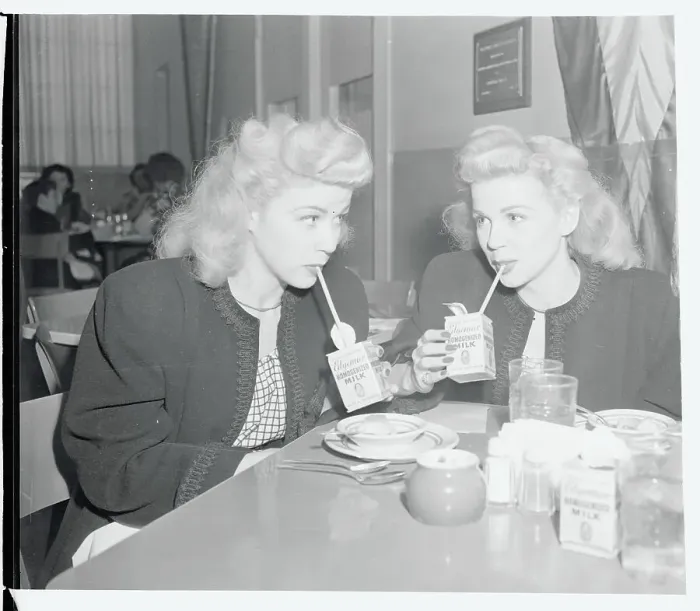 Framed Print : Twin Sister Actresses Drinking Beverages Framed Print : Twin Sister Actresses Drinking Beverages