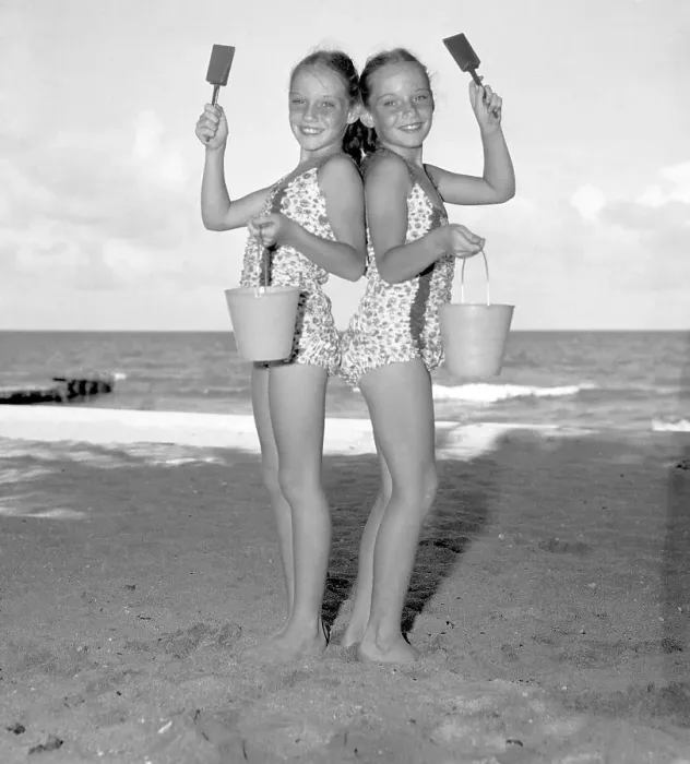 Framed Print : Twin Sisters (10-12) Posing With Their Sand Buckets and Shovels