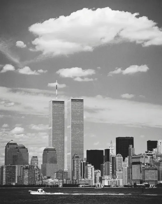 Framed Print : Twin Towers with boat in the foreground, New York, USA Framed Print : Twin Towers with boat in the foreground, New York, USA