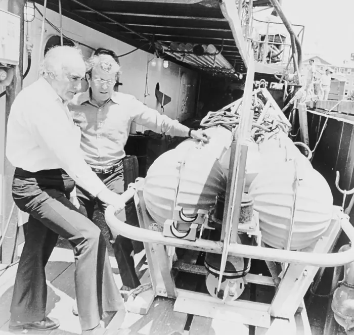 Framed Print : Tycoon Jack Grimm and Associate with Oceanography Device Framed Print : Tycoon Jack Grimm and Associate with Oceanography Device