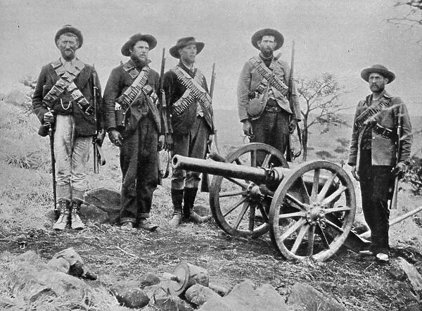 Boers. A typical Boer scout detachment pose with a captured gun