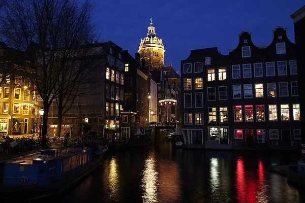 Typical Dutch canal houses and St. Nicholaschurch