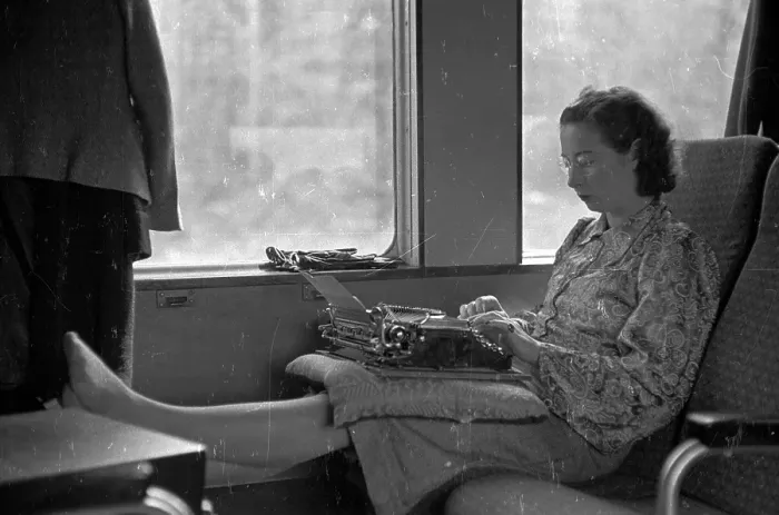 Framed Print : Typing Passenger Framed Print : Typing Passenger