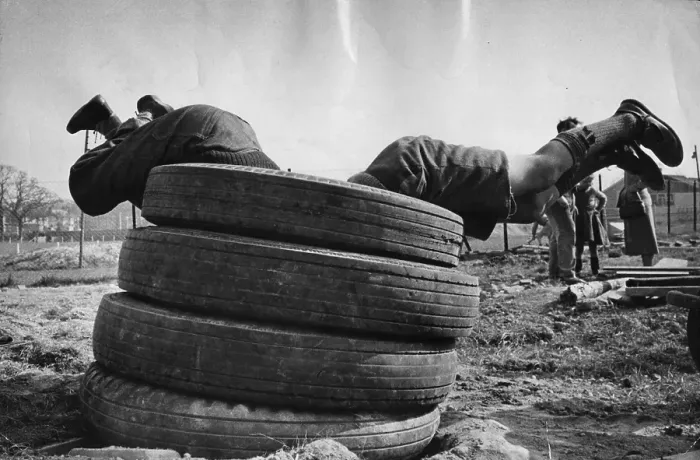 Framed Print : Tyre Dive. Two boys diving through some tyres Framed Print : Tyre Dive. Two boys diving through some tyres