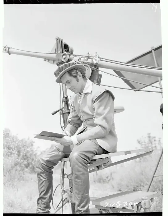 Framed Print : Tyrone Power Reading a Best Seller Framed Print : Tyrone Power Reading a Best Seller