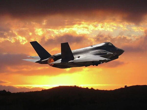 A U. S. Marine Corps Lockheed Martin F-35B Lightning II stealth fighter takeoff during sunset