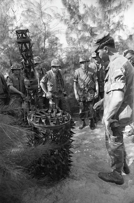 Framed Print : U. S. Soldiers Standing Around Trap Mechanism Framed Print : U. S. Soldiers Standing Around Trap Mechanism